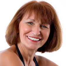 Woman smiling to show white teeth